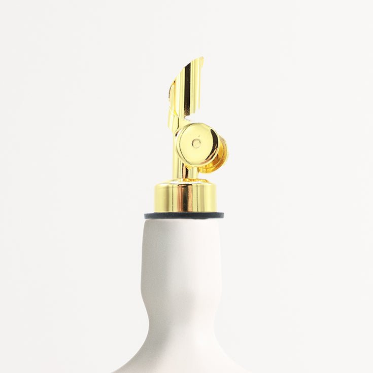 The Self-Closing Gold Spout